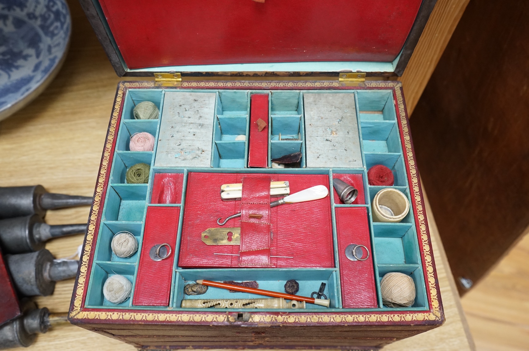 A Regency Morocco leather sewing and writing casket, 26cm and a Chinese Feng shui compass